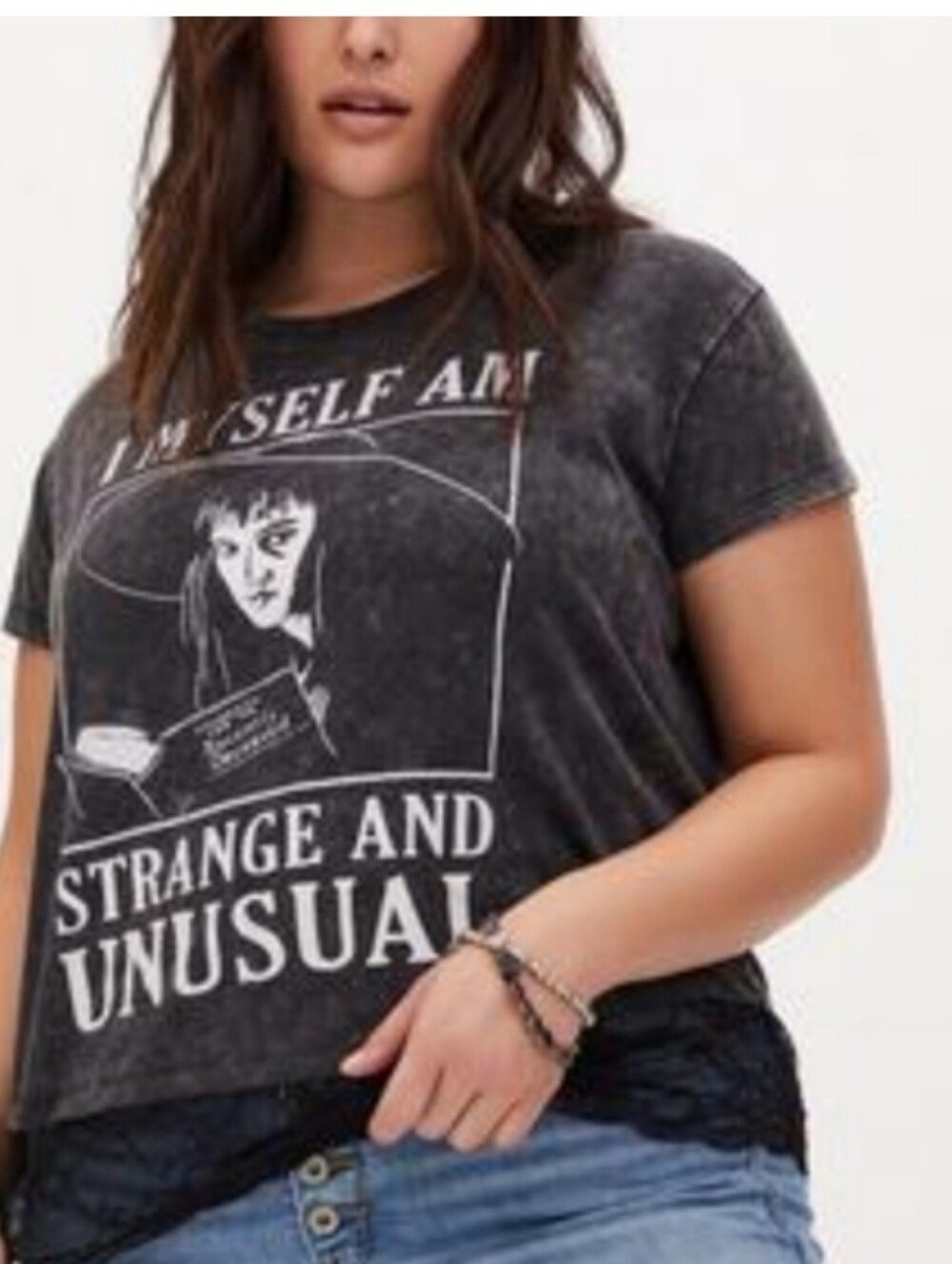 Torrid Beetlejuice "I Myself Am Strange and Unusual" tee with a lace hem detail.